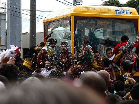 FAITHFUL gather at Ayala Bridge for the annual Feast of the Black Nazarene.