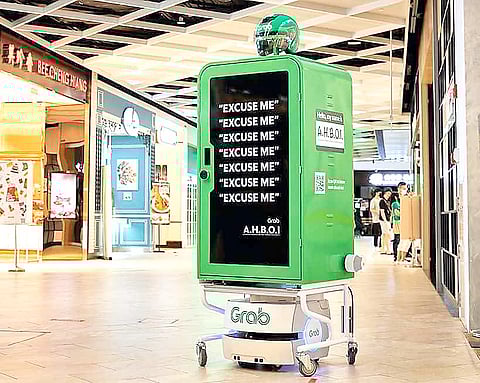 AUTOMATED delivery robots like this Grab unit show how the platform is testing new ways to handle short-distance deliveries in busy commercial spaces.