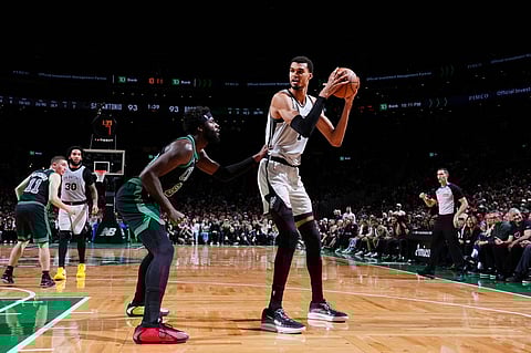 Victor Wembanyama #1 of the San Antonio Spurs handles the ball during the game against the Boston Celtics on January 10, 2026 at TD Garden in Boston, Massachusetts.