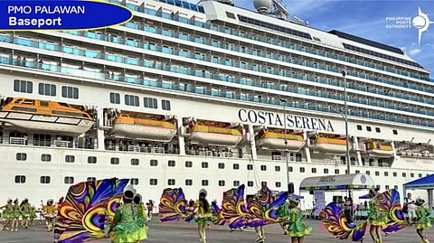 LOCALS perform a welcome dance for passengers and crews of the MV Costa Serena at the Puerto Princesa port.