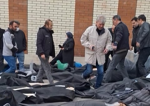 DOZENS of body bags lay on the ground at the Tehran Province Forensic Diagnostic and Laboratory Center in Kahrizak, Iran as grieving relatives search for their loved ones. Other videos showing the same scenes first appeared online on 10 January 2026.