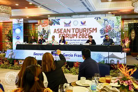 Tourism Secretary Christina Garcia Frasco (seated 4th from left) discusses the preparations for the ASEAN Tourism Forum slated from 28 to 30 January in three Cebu cities.   