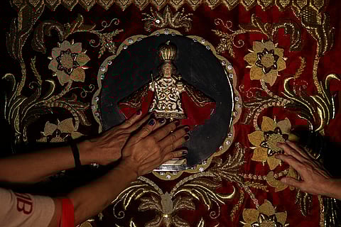 Catholic devotees visit Santo Niño de Tondo ahead of its feast