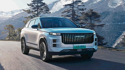 ON the road, the JAECOO J7 SHS moves through mountain terrain as the brand highlights its hybrid range and long-distance capability.