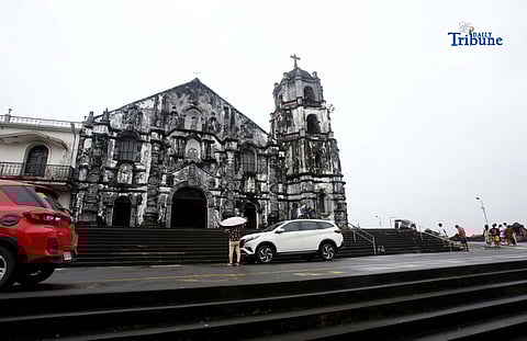Local tourists attended mass and took selfies at the 18th-century Church of Nuestra Señora de la Porteria (Our Lady of the Gate, commonly known as Daraga Church), overlooking the sea and the majestic Mayon Volcano, on Sunday, 18 January 2026.