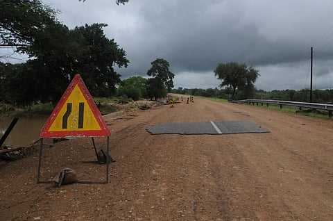 A general view of a damaged road on the way from Giyani to Mbaula on January 17, 2026 following heavy rains over much of the Limpopo Province, South Africa. Heavy rains have drenched the northeast of the country since late last year, claiming at least 30 lives.