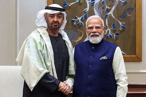 This handout photograph taken and released by the Indian Press Information Bureau (PIB) on January 19, 2026 shows UAE President Sheikh Mohamed bin Zayed al-Nahyan (L) shaking hands with India's Prime Minister Narendra Modi during their meeting in New Delhi.