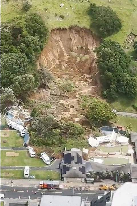 THE landslide in Mount Maunganui smashed into a campsite in rain-swept northern New Zealand on 22 January, killing at least two people and leaving others missing under tons of mud. 