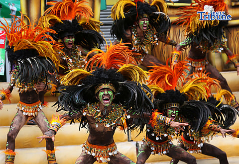 (January 25 2026) Dinagyang participants with painted faces, bodies and a colorful tribal warrior costumes seen perform ing to compete in Iloilo Dinagyang Festival 2026 compilation, about seven tribes are competing during the event, on Sunday January 25 2026, The Dinagyang Festival is a famous and religious and cultural festival in Iloilo City, Philippines held on the 4th Sunday of January. Photo/Analy Labor
