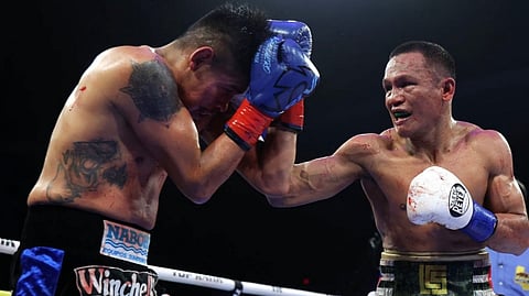 CHARLY Suarez (right) hopes to get his hands on Emanuel Navarrete again.