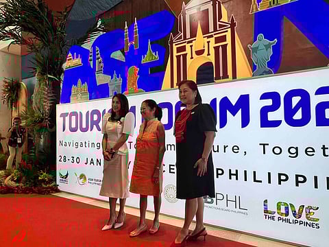 First Lady Liza Araneta Marcos (center) graces the opening of the ASEAN Tourism Forum on Wednesday, welcomed by Tourism Secretary Christina Garcia Frasco (left) and Lapu-lapu City Mayor Cindi King Chan in Mactan Expo, Lapu-lapu City. 