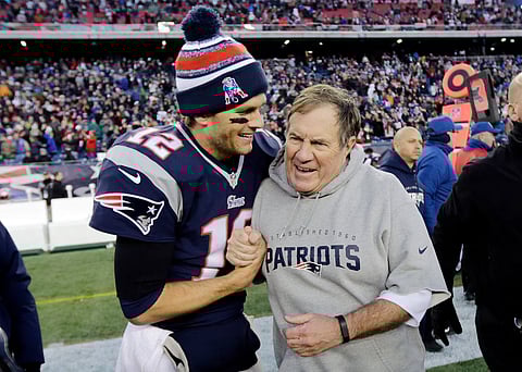 FORMER quarterback for New England Patrioats Tom Brady (left) with his former head coach Bill Belichick.