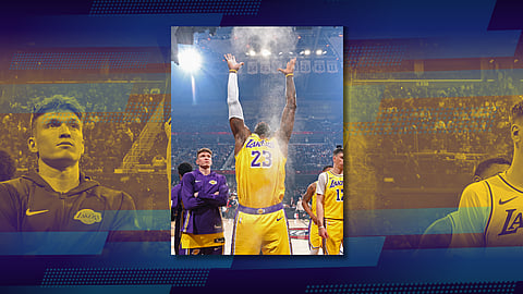 LEBRON James of the Los Angeles Lakers gets emotional during his return to his hometown, Cleveland, on Wednesday. The Cavaliers prevailed, 129-99.