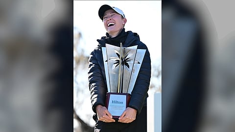 NELLY Korda smiles after capturing her 16th LPGA title following a victory at the Tournament of Champions in sub-freezing temperature at the Lake Nona Country Club in Orlando, Florida.