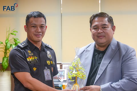 BJMP Mariveles JS Insp. Don Mari Phil B. Frayna presented AFAB Administrator and CEO Hussein Pangandaman with a bonsai made of wire created by the PDLs of the Mariveles Municipal Jail. 
