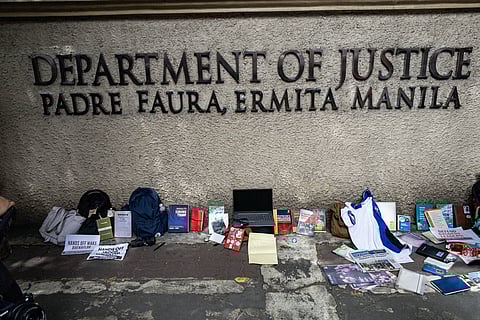 Student activists protest outside the Department of Justice in Manila on Wednesday, 4 February 2026, to call for the dismissal of sedition charges against more than 30 individuals who joined an anti-corruption rally on 21 September last year. 