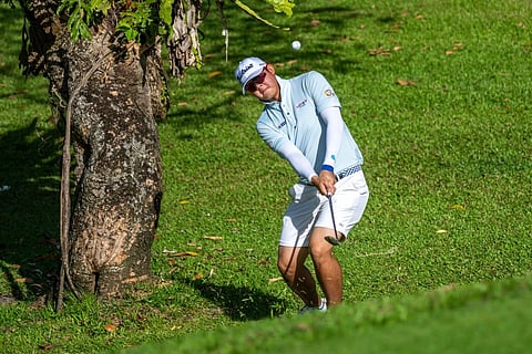 SARUT Vongchaisit brushes off the blustery weather to post a 4-under-par 68 to grab the clubhouse lead in the opening round of the Philippine Golf Championship on Thursday. 