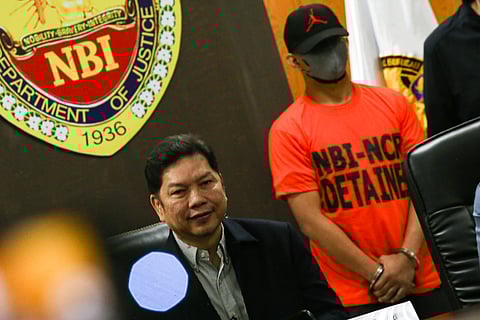 The National Bureau of Investigation (NBI), led by Director Angelito Magno, presents Patrolman Joshua Semilla Mendoza to the media during a press briefing at the NBI headquarters in Pasay City on 05 February 2026. Mendoza, a police officer accused of sexual assault, surrendered to the NBI and will be turned over to the proper court authorities for legal proceedings.
