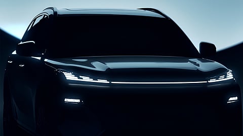 A GEELY SUV silhouette is shown during a preview as the brand outlines five new model launches planned for 2026.