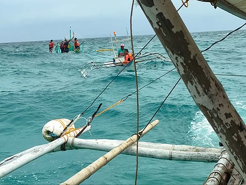 Rescue operation for the three passengers of motorized banca Realyn off the waters of Dimasalang, Masbate