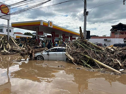 AFTERMATH Mud, debris and swollen streets mar Iligan City’s landscape in the wake of tropical storm ‘Basyang,’ yet another stark reminder of nature’s fury and the fragile line between calm and calamity.           
