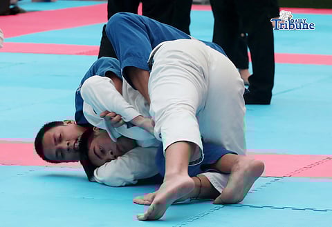 Fighters from various teams compete for victory during the ASEAN International Jiu-Jitsu Open Championship 2026, held at a mall in Araneta City, Quezon City, on Saturday.