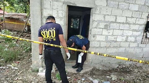 A POLICE line marks the house in Barangay E. Lopez, Silay City, Negros Occidental, where a heinous crime took place on Saturday as authorities continue their investigation.