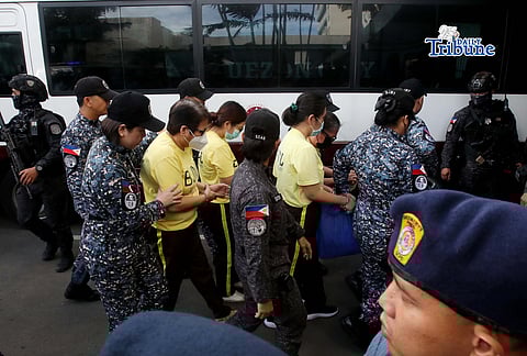 Bureau of Jail Management and Penology (BJMP) personnel heavily guarded former Senator Ramon “Bong” Revilla Jr., along with 15 co-accused, as they arrived at the Sandiganbayan in Quezon City on Monday, February 9, 2026, to attend the hearing on their malversation and graft cases over alleged anomalous flood control projects. Photo/Analy Labor