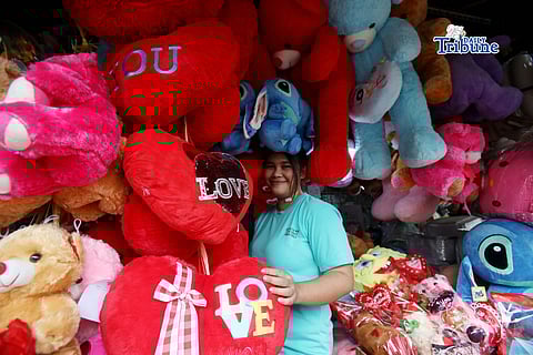 (February 10 2026) Sales lady at Commonwealth market in Quezon City, tends her customer buying a colourful heart shape and stuffed toys for a gift to their loved ones on Tuesday February 10 2026, days before valentines day celebration. Photo/Analy Labor
