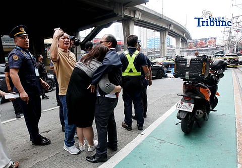 (February 11 2026) Relatives of the college male student died after jumping from LRT Fernando Poe Jr. Station station northbound platform to the street level of Epifanio Delos Santos Avenue (EDSA), and dragged by a passing vehicle after he jumped, emotional when they arrive in the area and see the lifeless body of their loved ones. Photo/Analy Labor