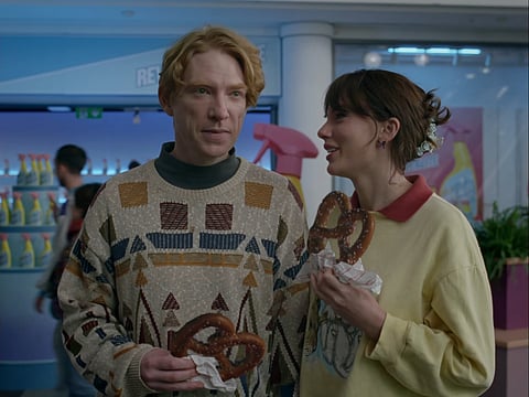 Taylor Swift and Domhnall Gleeson.