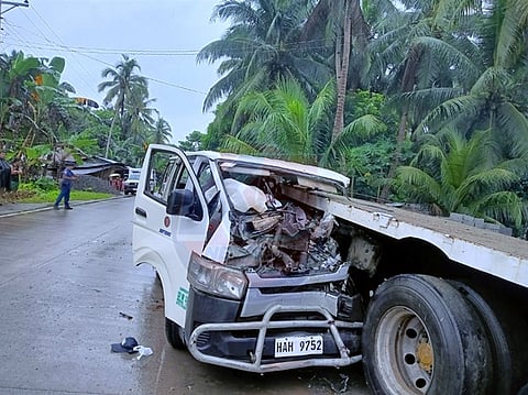 The aftermath of the crash of a van into the rear end of a parked trailer truck along National Highway in Barangay Balud in Basey, Samar that led to the death of three passengers and the driver of the van last February 10.