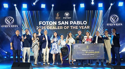 WINNERS from Foton San Pablo, together with Foton Motor Philippines chairman Rommel Sytin (fifth from the left), receive the 2025 Dealer of the Year award at the GRIT Awards in Subic.