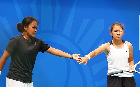 DOUBLES partners Tennielle Madis (left) and Stefi Aludo find a spot on the University of Hawaii tennis team seeing action in the US NCAA Division 1.