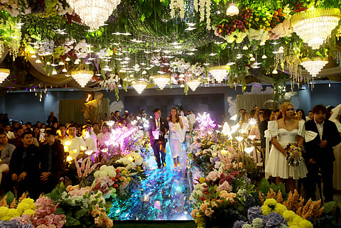 LOVE takes center stage as LGBTQIA+ couples proudly profess their commitment during a ceremony organized by the Quezon City government at the MICE Center on 14 February 2026.