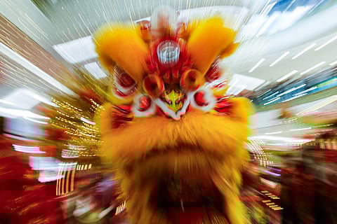 Members of the Philippine LingNam Athletic Federation perform traditional Chinese martial arts during SM City San Lazaro’s “Grand Lucky Dance” on Sunday, 15 February 2026, drawing crowds of shoppers as Manila marks the height of Lunar New Year celebrations.