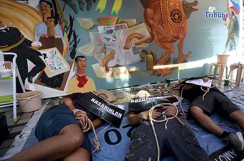 In commemoration of their 154th anniversary at the EDSA Shrine in Quezon City on Tuesday, 17 February 2026, cultural artists staged a reenactment and contemporary interpretation of the execution and martyrdom of Fathers Mariano Gomez, Jacinto Zamora, and Jose Burgos—collectively known as “GomBurZa.” The performance highlighted contemporary issues facing the country, including injustice, the struggle for freedom, and the pursuit of truth, amid recent government corruption controversies.

Photo by Analy Labor