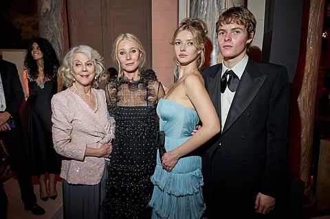 Apple Martin with her grandmother Blythe Danner, mother Gwyneth Paltrow, and brother Moses Martin at Le Bal des Débutantes in Paris, November 2024.