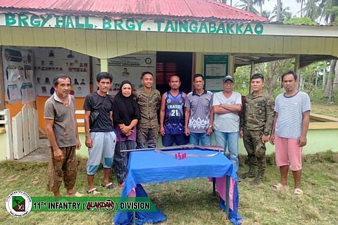 A local resident handed over a shotgun amid ongoing gun-free efforts in Banguingui.