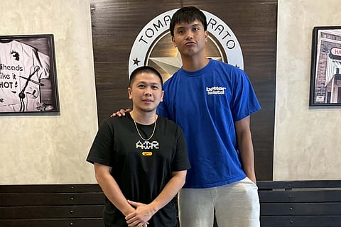 ARRIBA, MARK. Letran Knights head coach Allen Ricardo and their new recruit Mark Belmonte. 