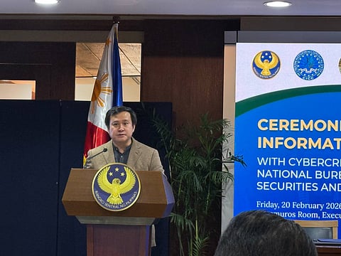 BANGKO Sentral ng Pilipinas General Counsel Roberto L. Figueroa speaks at the BSP headquarters on Friday, 20 February, at the ceremonial signing of the information sharing agreement with 3 other government agencies to combat financial scams. 