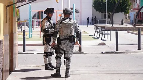 Playground gun attack kills 2, wounds 8