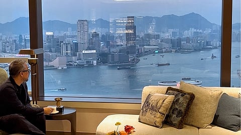 FROM the 50th floor of Island Shangri-La, the city unfolds slowly — mountains behind, the Victoria Harbour ahead, and a suite that holds both quiet and grandeur in equal measure.
