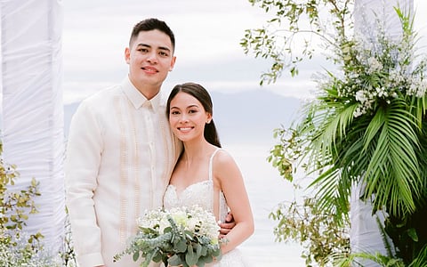 MR. and Mrs. Nicolo and Danielle Santos.