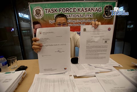 (February 21 2026) Task Force Kasanag (TFK) Founder John Chiong shows the ethics complaint filed at the Office of the President, by the group against House Committee on Public Works Chairperson and Surigao del Sur 1st District Representative Romeo Salazar Momo Sr. during press conference in Quezon City on Saturday February 21 2026. Photo/Analy Labor