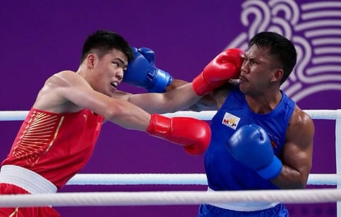 EUMIR Marcial (right) will be one of the country’s top gold medal hopes in the 20th Asian Games in Aichi-Nagoya.