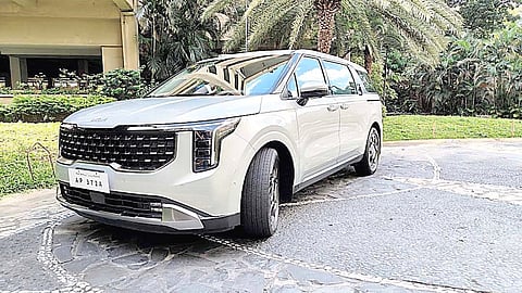 FRONT styling gives the Kia Carnival HEV a wide stance that hints at its size before you step inside.