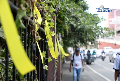 Yellow ribbons were seen tied along EDSA in Quezon City on Monday, 23 February 2026, ahead of the 40th EDSA People Power celebration.