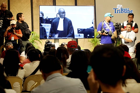 Families of the EJK victims watch the International Criminal Court (ICC) confirmation of charges hearing against former President Rodrigo Duterte in his crimes against humanity case linked to the government’s anti-drug campaign, held at Atencio Libunao Hall in the University of the Philippines, Diliman, Quezon City, on Monday, 23 February 2026.