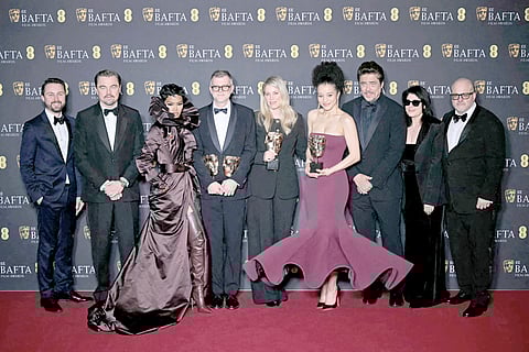 US actor Leonardo DiCaprio, American singer-songwriter and actor Teyana Taylor, US film director Paul Thomas Anderson, US film producer Sara Murphy and actor Chase Infiniti pose with the award for Best Film for ‘One Battle After Another’ during the BAFTA British Academy Film Awards ceremony at the Royal Festival Hall, Southbank Centre, in London.